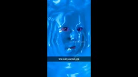 Toddler using snapchat with mom
