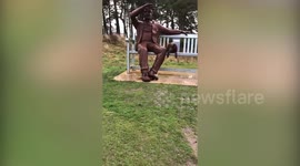 Hilarious moment dog demands statue in UK park to play fetch with him