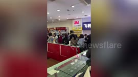 Shanghai residents queue in pharmacies to buy masks amid the spreading of a coronavirus in China