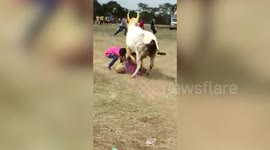 Mother and sons barely dodge being trampled by rogue bull in south India