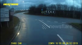 Truck blocks car from driving wrong way.