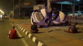 Car spins out of control and crashes into utility pole in Thailand