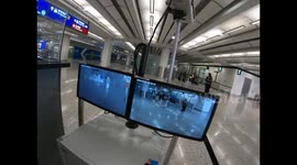 Infrared thermal scanning displays the temperature of arriving travellers at Hong Kong International Airport as coronavirus spreads