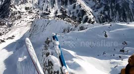 Brave US skier speed flies over stunning alpine scenery in Utah