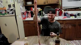 Man Tries to Eat Animal Intestines .......