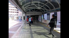 Panning and entrance of Queen Elizabeth hospital in Kowloon, Hong Kong