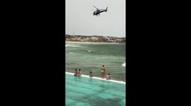 Aussie police dispatch land, sea and air officers to arrest man on Bondi beach