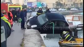 Driver rescued from a hanging car