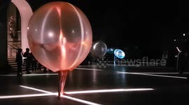 Watch footage of Fredrik Tjærandsen's balloon-like fashion collection