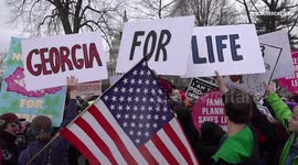 Thousands flood US capital for anti-abortion march attended by Trump