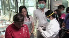 Thai airport screens passengers for coronavirus as country confirms fifth case of the illness