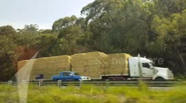 180 truck convoy donates hay to drought affected farmers  north of Sydney Australia