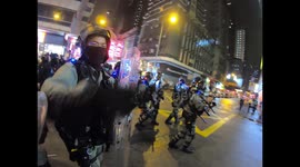 Riot police clear streets as crowd gathers to mark 4th anniversary of Mong Kok riots