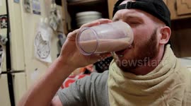 Man Drinks An Insect and Hotdog Milkshake