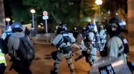 Coronavirus: Hong Kong police charge residents after protest against