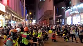 Hong Kong Lunar New Year revellers sing protest songs at traditional street food market