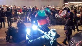 Tension in Hong Kong as riot police make arrests storming street food market