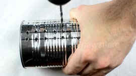 Recycling a cheap tin can into a DIY grater is the ultimate kitchen hack