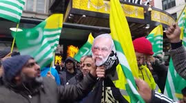 Kashmir solidarity demonstration sees protesters hit Modi mask with shoe