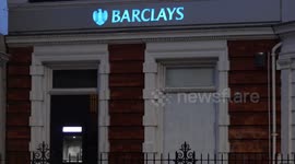 Antisemitic graffiti on London branch of Barclays bank painted over by council