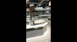 Staff at Wuhan Grocery story