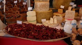 Traditional Swiss cheese being sold in Basel's market square.