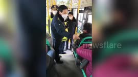 Elderly Chinese woman confronted after refusing to wear mask on bus during coronavirus outbreak
