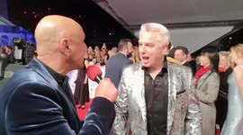 Doctor Who Actor John Barrowman And Eastenders Actress Danielle Harold Arrive At The NTA Awards Red Carpet