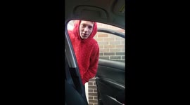 Teen learning to pump gas