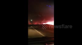 Aussie captures apocalyptic scenes as sky glows from bushfires