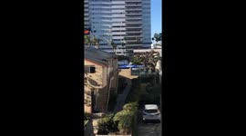 LA Firemen Saving Man From Burning Building on Wilshire Blvd.