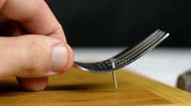 DIY guru demonstrates 10 safe and simple ways to hammer a nail using household objects