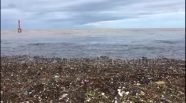 Beach Becomes a Sea of Garbage Piles
