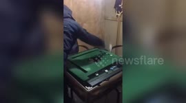 Chinese police smash mahjong tables to stop residents gathering during the coronavirus outbreak