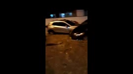 Flooding in Colombia cause damages to streets and vehicles