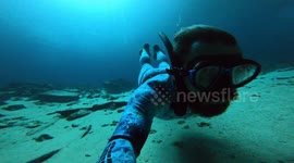 Freediver explores crystal clear cave in Mexico that looks out of this world