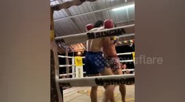 Incredible double knock-out floors both fighters at Muay Thai boxing match
