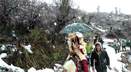 Heavy snowfall doesn't stop excited groom who braves winter blockades to reach bride in north India