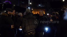 Brexit supporters surround Nigel Farage's car as he leaves Westminster rally