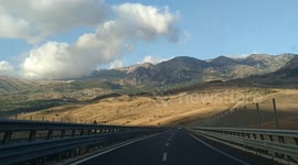 Road trip in a mountainous scenery before sunset, on the way to Palermo, Sicily