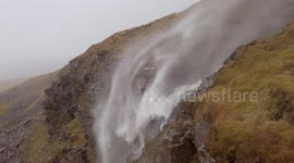 Gale-force winds defy gravity and push waterfall up cliff in UK