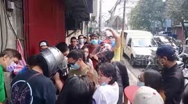 Filipinos queue for face masks as country sees first coronavirus death outside China
