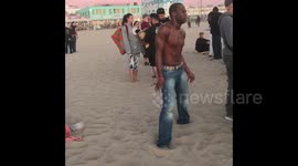 Drum circle on Venice beach with some interpretive dance