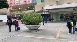 Lion dancers wear masks in Hong Kong as coronavirus claims first death in the ciry