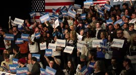 Crowd chants 'Not Me. Us' as Bernie Sanders takes the stage in Iowa despite delay in results