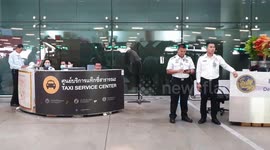 Thai airport staff disinfect taxis to help prevent spread of coronavirus