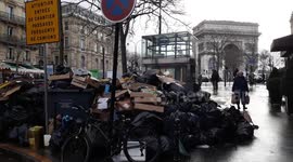 Parisian sidewalks covered in sea of rubbish as waste disposal goes on strike