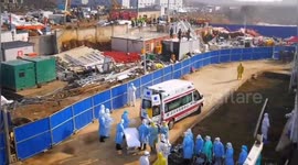 First coronavirus patients arrive at new Wuhan hospital that was built in eight days