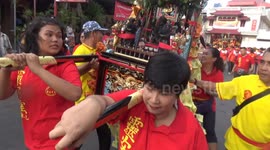 Chinese citizens in the fields of kio or gods