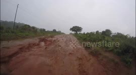 Travelling couple record roads in Zambia crumbling to mud in chaotic weather